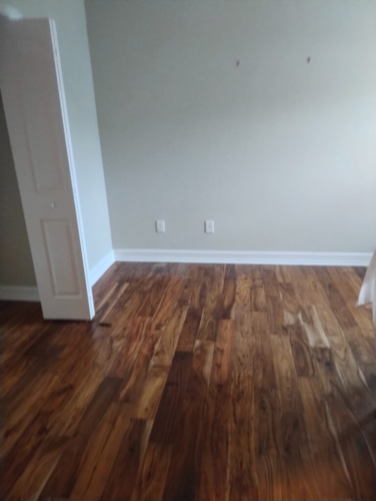 Clean empty bedroom with open closet and cleared floors after junk removal in Citrus County Florida